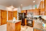Expansive kitchen with island in this one bedroom